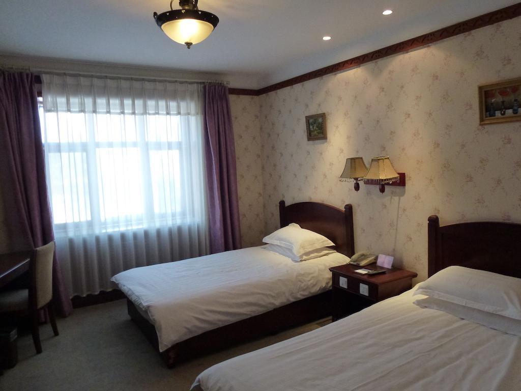 Hotel Harbin Volgamanor Acheng Zimmer foto