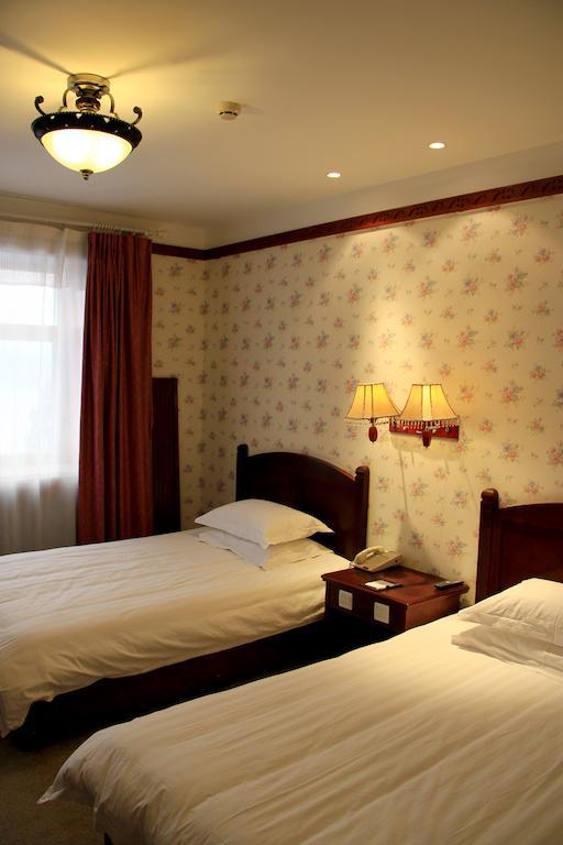 Hotel Harbin Volgamanor Acheng Zimmer foto